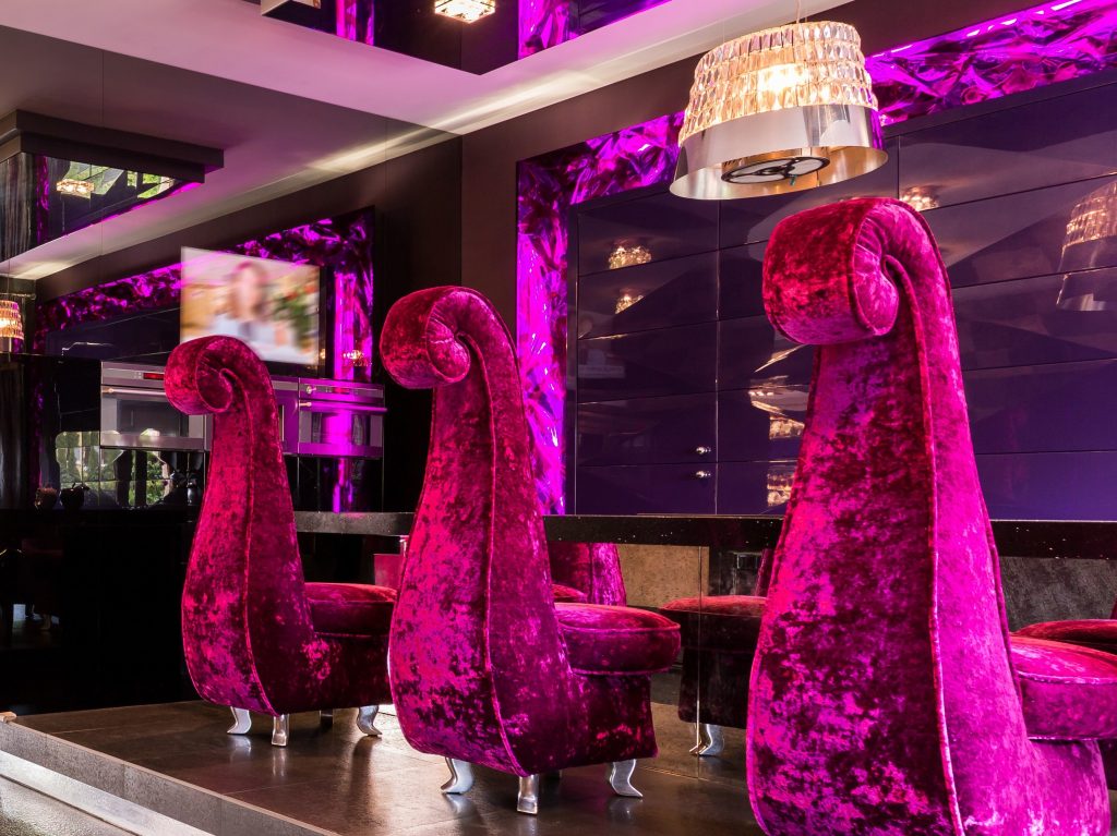 boutique hotel with purple chairs
